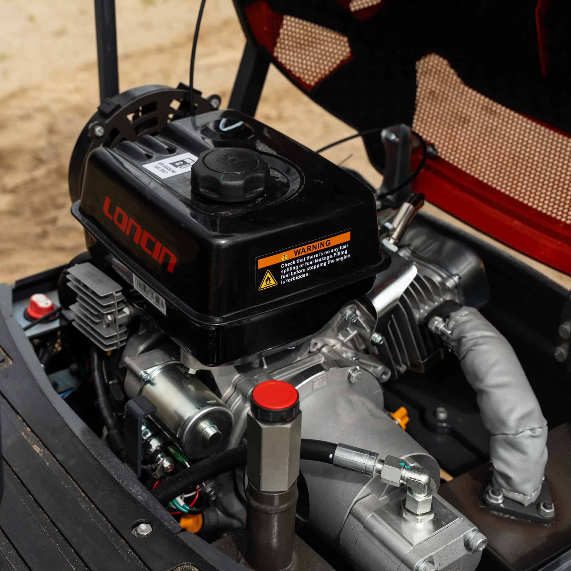 Close-up of Yardex Group equipment engine with detailed components and branding.